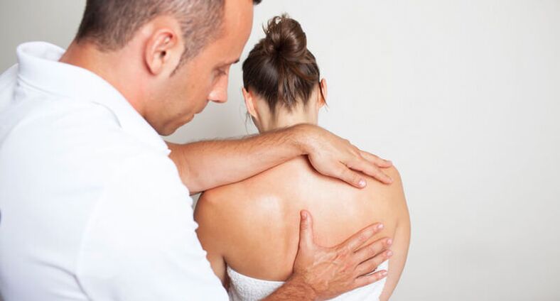 back examination and massage by a specialist